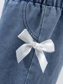 Young Girl Solid Color Round Neck Top And Bow Decor Distressed Frayed Hem Denim Shorts - Multicolor - View 4