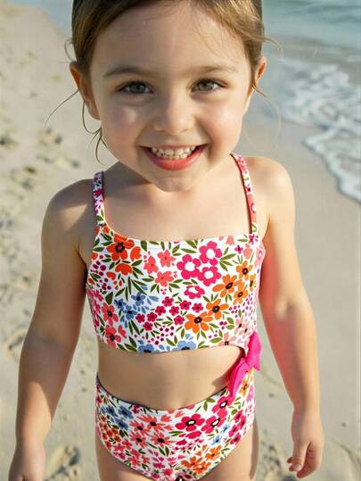 Traje de baño de una pieza para niña, diseño asimétrico con lazo lindo y estampado digital floral, traje de baño para vacaciones en la playa