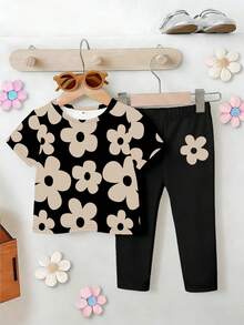 Bộ đồ cho bé gái gồm áo thun ngắn tay cổ tròn in họa tiết hoa tối giản dễ thương và quần legging đen, thích hợp cho các hoạt động mùa xuân/hè. - Nhiều màu - Xem 3