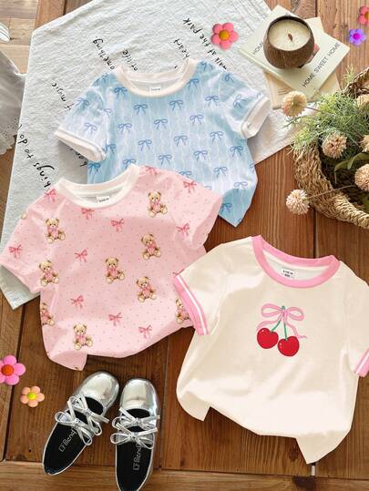 SHEIN 3pcs/Set Young Girl Casual Macaron Series Cream Pink, Cream White, Cream Blue Color, Retro Cute Cherry, Bow, Bear Print Fashion Sweet Round Neck Short Sleeve T-Shirts, Suitable For Spring/Summer Daily Wear, Street Style