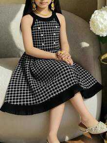 Elladie kids 这款少女连衣裙采用法式格纹面料，露背设计，黑色滚边，仿珍珠纽扣点缀，收腰设计，褶裥下摆，修身优雅，适合生日派对、钢琴演奏会、家庭聚会、节日庆典、正式和休闲场合。 - 黑色 - 查看 3