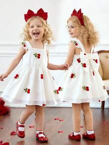Ruffle Strap Cherry Puff A-Line Dress. Featuring Ruffle Trim Shoulder Straps, A 3D Bow At The Back, And A Puff A-Line Silhouette That Ensures Freedom Of Movement While Maintaining An Elegant Look. Suitable For Outings, Friend Gatherings, And Family Celebrations, Making Your Little One The Center Of Attention. - Apricot - View 1