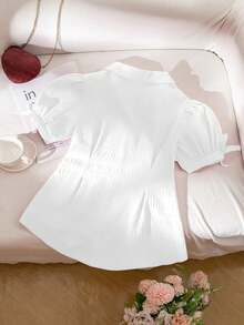 SHEIN Áo sơ mi cài cúc kẻ caro đỏ cho bé gái tuổi teen: Tay phồng, viền bèo nhún, kiểu dáng thường ngày đa năng, phù hợp cho những ngày đi học, cuối tuần dạo chơi hoặc họp mặt gia đình. Họa tiết kẻ caro và chất liệu thoải mái - hoàn hảo cho vẻ ngoài sành điệu hàng ngày (Kích cỡ dành cho bé gái tuổi teen). - trắng - Xem 2