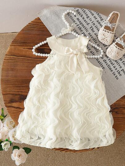 SHEIN Toddler Girls' Sleeveless Ivory Dress With Matching Bow Accent At Neckline, Sweet And Refreshing Elegant Design, Suitable For Party, Banquet, Birthday, Holiday Occasions