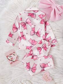 Set de 2 piezas de pijama informal y cómodo con pantalón largo y manga larga con estampado de moño en tela de tafetán para niñas jóvenes - Albaricoque - Ver 2