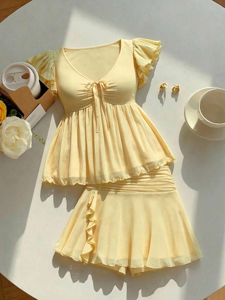 SHEIN MOD Bộ đồ 2 món thời trang màu vàng dành cho nữ cỡ lớn: Áo tay ngắn buộc dây phía trước và chân váy ngắn. - Màu vàng - Xem 1