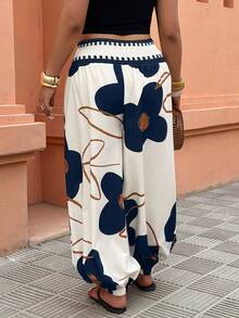 SHEIN LUNE Quần ống loe cạp chun dành cho nữ cỡ lớn, quần dài thoải mái cho kỳ nghỉ, họa tiết hoa thời trang, thích hợp cho mùa hè. - Nhiều màu - Xem 2