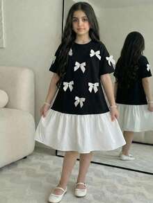 SHEIN Vestido midi casual para meninas pré-adolescentes com laço grande contrastante em preto e branco, modelagem solta e mangas curtas. - Preto e Branco - Ver 8