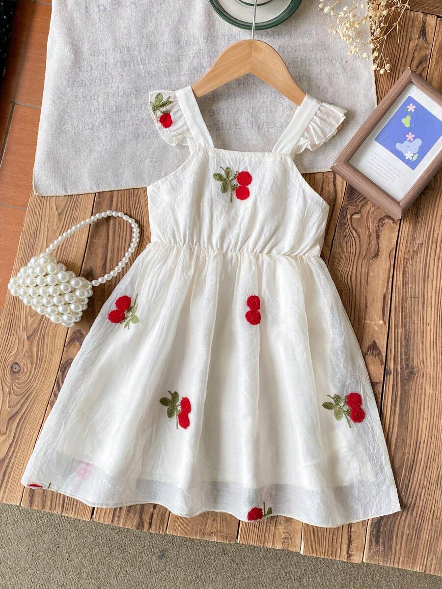 荷叶边吊带樱桃泡泡A字连衣裙。这款连衣裙采用荷叶边肩带设计，背部饰有3D蝴蝶结，蓬松的A字廓形既保证了活动自如，又不失优雅气质。适合外出、朋友聚会和家庭庆典等各种场合，让您的宝贝成为众人瞩目的焦点。 - 杏色 - 查看 1