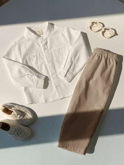 SHEIN Bộ 2 món cho bé trai, gồm áo sơ mi dài tay màu xanh nhạt dễ thương và quần cạp chun, thích hợp cho tiệc sinh nhật, tiệc rave, tiệc tối, biểu diễn, đám cưới, lễ đầy tháng, lễ rửa tội và lễ kỷ niệm sinh nhật lần thứ nhất, khách mời đám cưới, trang phục dự tiệc mừng em bé chào đời.