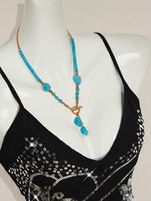 SHEIN ICON Áo hai dây nữ màu xanh dương thêu hạt cườm họa tiết hoa Y2K, vạt áo bất đối xứng, kiểu dáng ôm sát, gợi cảm, thích hợp mặc ngoài vào mùa hè. - màu đen - Xem 9