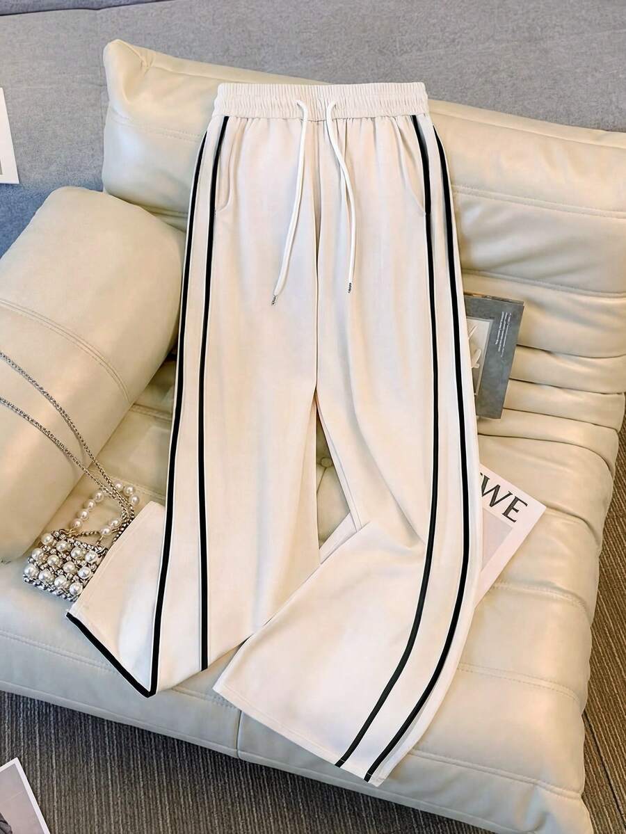GlowEve Women's Casual Drawstring Waist Contrast Striped Side Loose Flowy Wide Leg Pants, Spring/Summer - White - View 1