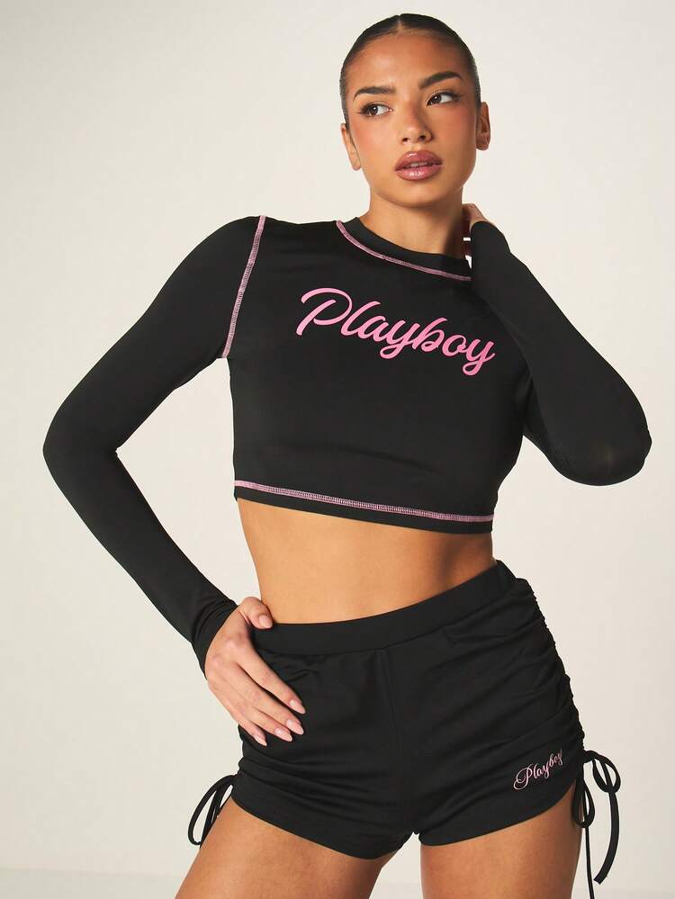 Missguided x Playboy Long Sleeve Crop Top With Pink Contrast Stitching And Text Print For Casual Fall Winter Style