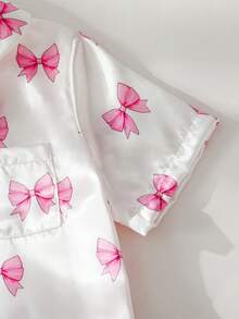 Bộ quần áo mặc nhà cho bé gái, gồm áo ngắn tay, cổ bẻ, in nơ màu hồng và quần short, chất liệu chống cháy. - Màu Hồng baby - Xem 6