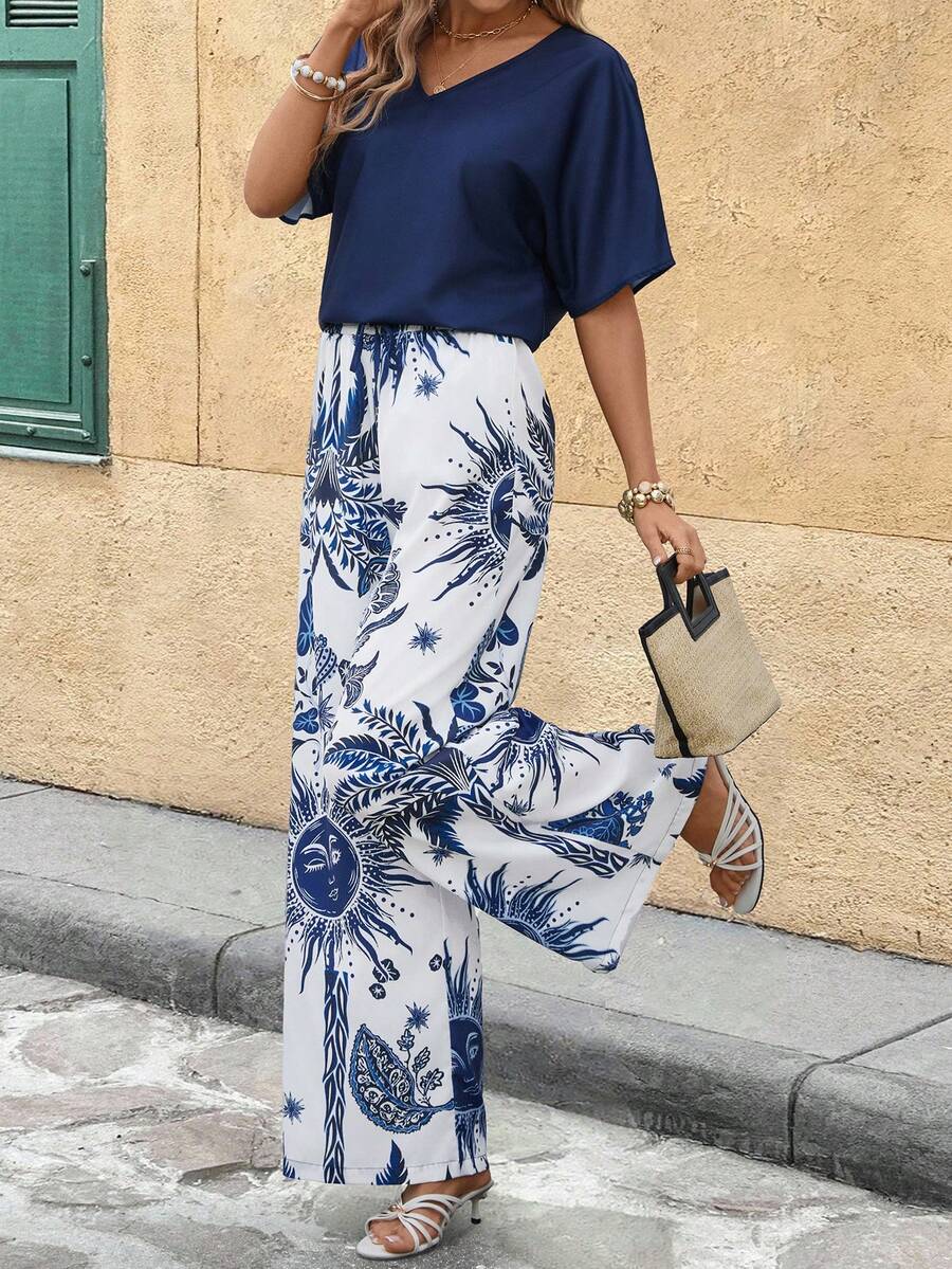 SHEIN Clasi Bộ đồ 2 mảnh phong cách Bohemian thanh lịch dành cho nữ, gồm áo cổ chữ V in họa tiết xanh trắng và quần ống đứng cạp chun, thích hợp cho kỳ nghỉ hè, trang phục thường ngày cho nữ, bộ đồ hè kín đáo cho nữ, trang phục lễ hội 2 mảnh. - Nhiều màu - Xem 1