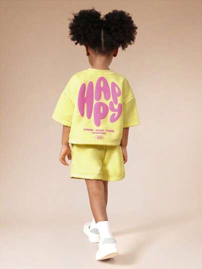 SUMWON Conjunto de verano a juego de camiseta de manga corta con estampado de lema feliz y pantalones cortos a juego con cuello redondo para uso casual y vacaciones