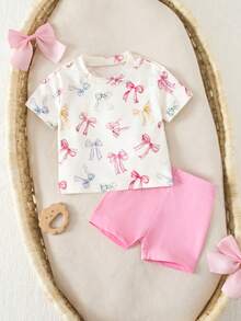Conjunto de camiseta de manga corta con patrón de lazo y pantalones cortos de cintura elástica, estilo casual de verano para bebé niña recién nacida - Rosa - Ver 8