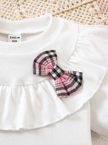 SHEIN Elladie kids 两件套女童休闲新款T恤套装，正面可爱粉色格子图案3D蝴蝶结设计，白色罗纹针织荷叶边T恤，搭配粉色格子开衩短裙，适合可爱、俏皮、休闲、舒适的日常穿着，也适合上学、郊游、海滩、派对等场合。春夏两件套儿童套装，格子裙，女童夏季格子裙，幼儿女童可爱复古风蝴蝶结套装，女童服装裙装套装 - 彩色 - 查看 10
