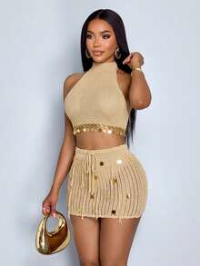 SOLERSUN 这款女士夏季度假套装包含一件亮片编织无袖露背镂空迷你连衣裙，包括一件挂脖上衣和一条饰有亮片贴花的镂空流苏迷你裙。非常适合夏季海滩度假和泳池边休闲时光。 - 咖啡棕 - 查看 5