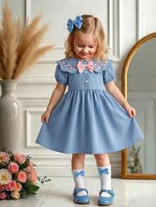 1 pieza Vestido para niñas jóvenes con cuello Peter Pan, bordado floral, mangas abullonadas y lazo azul, vestido de princesa de verano para el 7º cumpleaños, a juego con la familia, lindo y casual para primavera - Azul - Ver 2