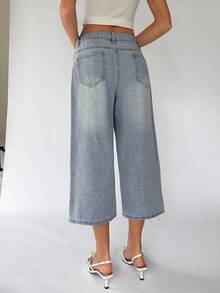 SHEIN TRNDY Quần jeans ống lửng 7/8, cạp thấp, kiểu dáng thời trang, dáng casual, có túi xéo, đã qua xử lý giặt. - Rửa nhẹ - Xem 2