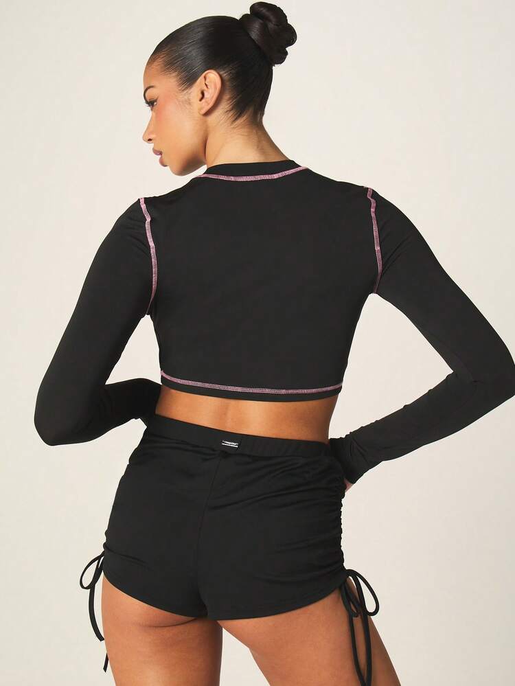 Missguided x Playboy Long Sleeve Crop Top With Pink Contrast Stitching And Text Print For Casual Fall Winter Style
