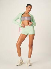 Missguided x Playboy High Waisted Athletic Shorts With Logo Print Perfect For Active Lifestyle And Summer Workouts - Green - View 3