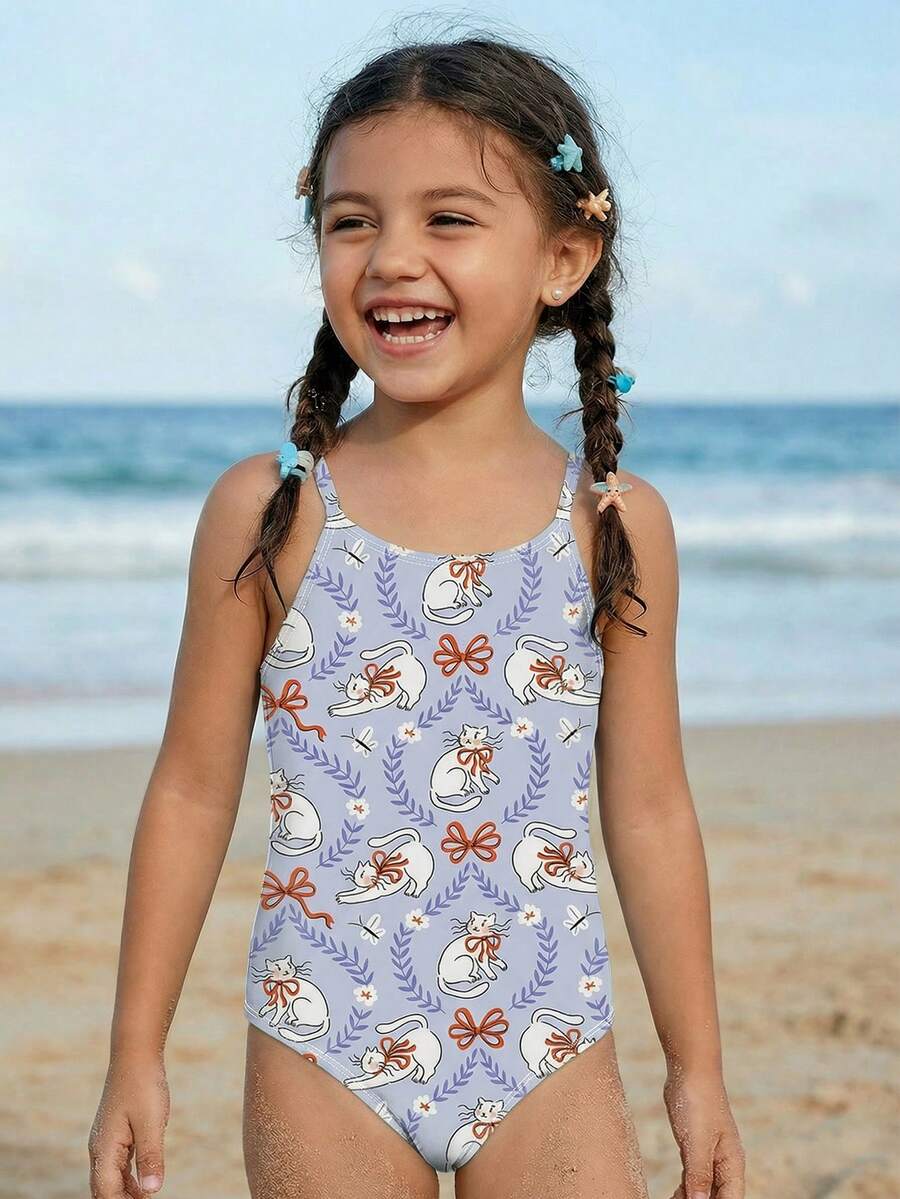 可爱猫咪印花女童连体泳衣，舒适针织面料，适合海滩、度假、冲浪、夏季穿着。这款连体泳衣款式多样，包括蓝色猫咪印花、紫色猫咪印花、蓝色等，适合年轻女孩穿着。 - 彩色 - 查看 1