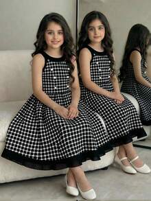 Elladie kids 这款少女连衣裙采用法式格纹面料，露背设计，黑色滚边，仿珍珠纽扣点缀，收腰设计，褶裥下摆，修身优雅，适合生日派对、钢琴演奏会、家庭聚会、节日庆典、正式和休闲场合。 - 黑色 - 查看 5