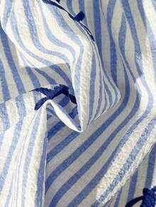 Conjunto de camiseta de tirantes con volantes y shorts con estampado de rayas y lazo para niña - Azul - Ver 5