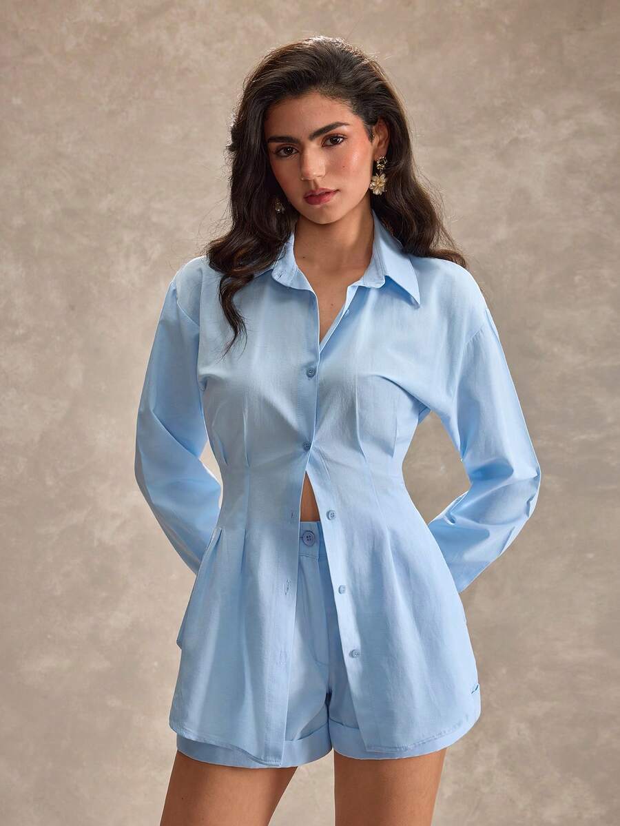 CLARA VERO Bộ áo sơ mi cài cúc phía trước và quần short cạp cao, dáng rộng, tay dài, đa năng, phù hợp mặc hàng ngày hoặc đi ăn trưa. Chất liệu polyester nhẹ, không co giãn, có đường viền gấu quần gập đôi gọn gàng. - Màu xanh lam - Xem 1