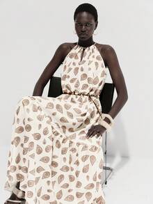 Lumivelle Women's Vacation Cashew Floral Print Ruffle Hem Halter Neck Dress - Apricot - View 7