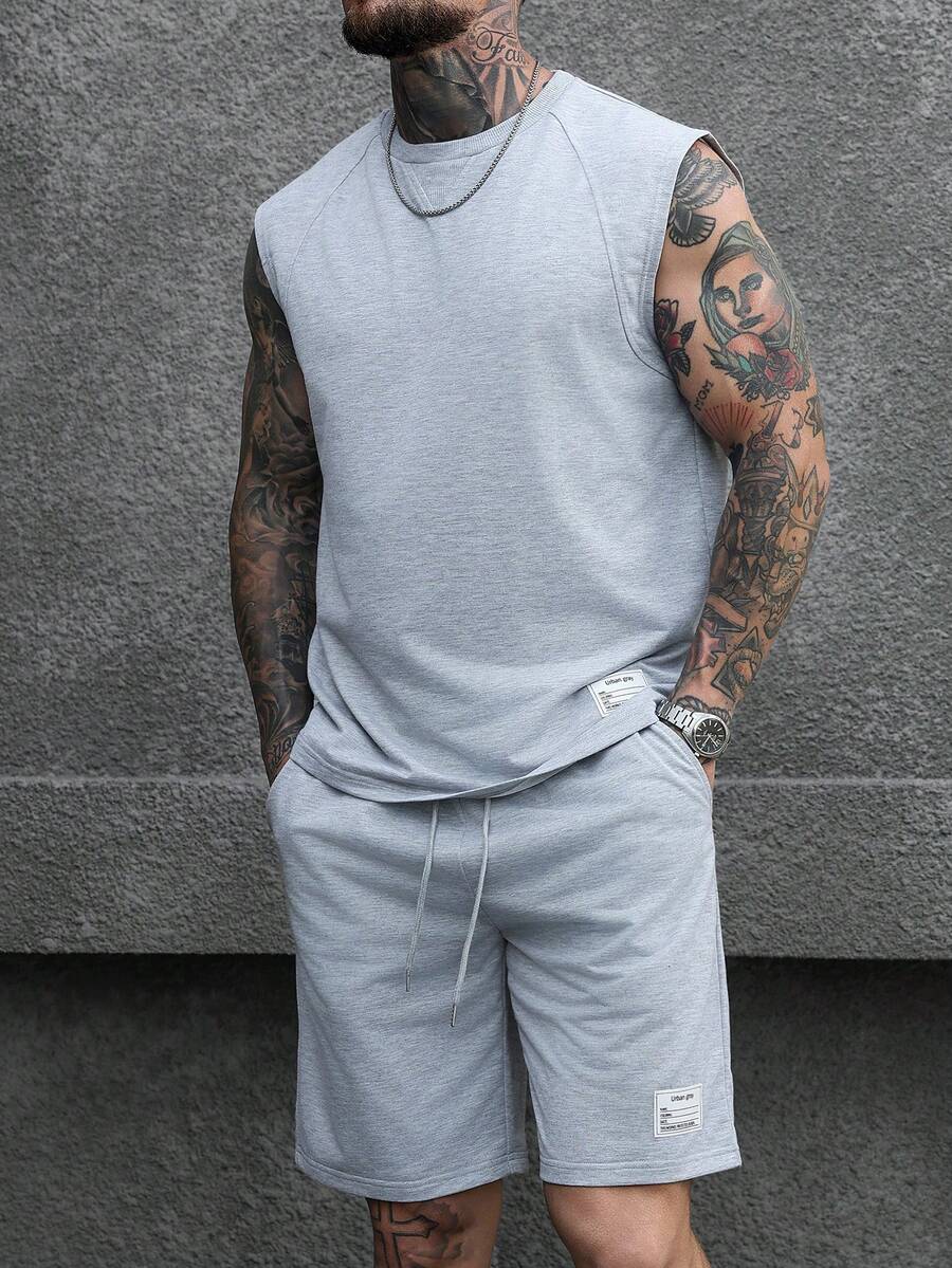 Manfinity Homme Bộ đồ nam gồm áo tank top cổ tròn, tay raglan, màu trơn, đơn giản, thích hợp mặc mùa hè, phong cách cổ điển, thích hợp mặc hàng ngày, đi chơi cuối tuần, hoạt động ngoài trời, du lịch, môi trường làm việc thoải mái hoặc các dịp bán trang trọng, quà tặng cho bạn trai/chồng, quà kỷ niệm/sinh nhật, tiệc tùng, kỳ nghỉ hè, đám cưới, từ xuân sang hè, lễ Phục sinh, áo tank top cổ tròn không tay cho nam, thích hợp cho các hoạt động thể dục và tập luyện thường ngày, bộ áo tank top và quần short nam, bộ quần short và áo tank top nam, bộ đồ thể thao mùa hè nam, bộ đồ tập thể hình nam. - Màu Xám nhạt - Xem 1