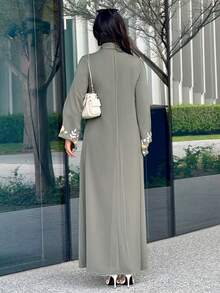 Al Najma Women's Printed Minimalist Everyday Long Sleeve Abaya - Green - View 2