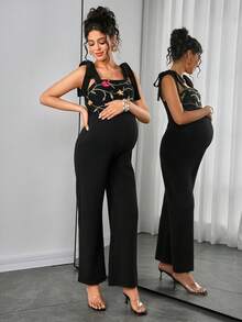 Momance 孕妇夏季休闲度假风花卉刺绣打结吊带连体裤 - 黑色 - 查看 5