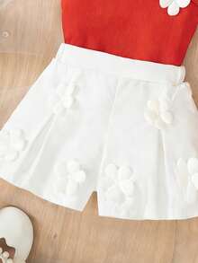 SHEIN Outfit alla moda coreana per bambine, decorazione floreale, set da 2 pezzi con canottiera a bretelle e pantaloncini eleganti, estivo - Arancione - Visualizzare 4