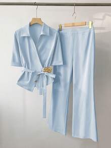 GlowEve Spring/Summer New Blue Short Sleeve Collared Shirt With Metal Buttons, Irregular Button Design, Elegant, Versatile, Paired With High Waist Flared Casual Pants, Simple Commuter Women 2 Pieces Set - Blue - View 7