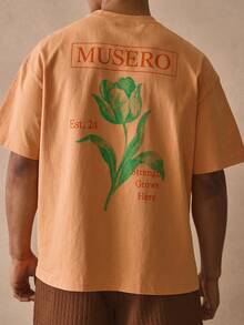 Musero Camiseta de cuello redondo de manga corta con hombros caídos y estampado floral gráfico de marca grande, esencial para primavera y verano - Naranja Coral - Ver 2