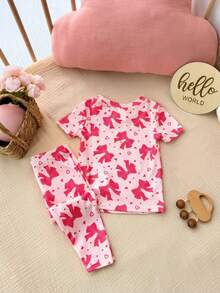 SHEIN Bộ đồ mặc nhà tay ngắn màu hồng dễ thương, kiểu dáng thường ngày cho bé gái, có nơ trang trí. - Hồng - Xem 9