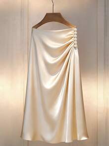 Franclia 2026春夏新款奢华优雅香槟色缎面光滑光泽面料仿珍珠装饰+斜褶设计约会/工作高端半身裙 - 香檳色 - 查看 1