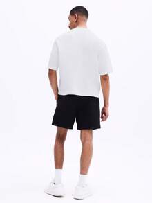 SUMWON Conjunto de natación para hombres con ribete de contraste, pantalones cortos de playa relajados y camisa de natación de manga corta para vacaciones de verano - Multicolor - Ver 2