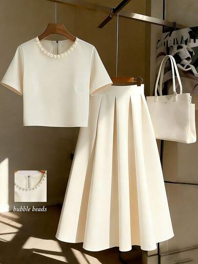 Franclia Ladies' Two-Piece Set, Ladies' Apricot-Colored Round-Neck Short-Sleeved Embroidered Top With Pleated Skirt Set, Elegant Evening Wear For Ladies, Formal Guest Attire For Ladies, Party And Birthday Dresses For Ladies, Stylish And Slim, Embroidered Beads And Pearls For Romantic Dates, Summer Style With Round Neck Top And Long Skirt Set, Casual 2pics.