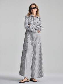 Ontre 2026春夏新款女士梭织连衣裙，条纹设计，黑白配色，宽松A字廓形衬衫裙，适合情人节、婚礼季、节日庆典、独立日等场合，打造都市时尚简约通勤风。 - 黑與白 - 查看 7