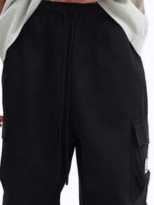 SUMWON Black Wide Leg Cargo Pants With Multiple Patch Pockets And Utility Details For Men Casual Streetwear - Black - View 7