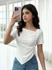 Tween Girls Asymmetric Shoulder T-Shirt - White. The Design And Side Ruching Create A Flattering Silhouette, Exposing The Shoulder And Neck Line While Cinching The Waist. The Asymmetrical Hem Also Subtly Enhances The Waist-To-Hip Ratio. This Basic Tee Can Be Easily Styled With Jeans Or Skirts For A Relaxed Yet Chic Look. - White - View 6