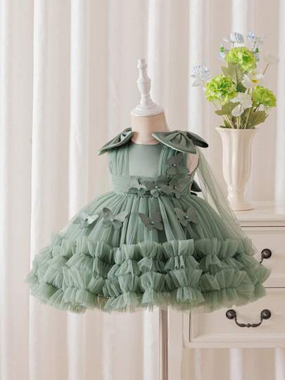 Glamorique Kids Váy tutu lưới dễ thương cho bé gái với nơ và trang trí ngọc trai, thích hợp cho tiệc sinh nhật, lễ hội, dạ hội, váy công chúa, màu xanh lá cây nhạt, váy xếp ly cho bé gái, váy sinh nhật màu xanh lá cây, váy dự tiệc cho bé gái, váy có họa tiết bướm.