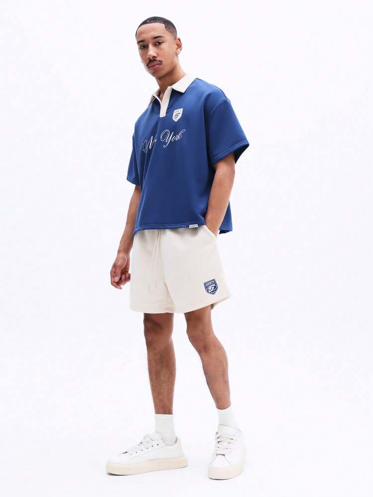 Men's Varsity Style Co-Ord Set With Collared Polo Shirt And Relaxed Fit Shorts With Embroidered Logo Details