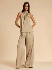 SHEIN BAE Conjunto feminino de cetim de duas peças, composto por blusa de gola halter cáqui claro e calça de cetim. Elegante conjunto de cetim para o verão, ideal para sair à noite, convidada de casamento e com um estilo francês refinado. Conjunto de cetim de duas peças na cor damasco, perfeito para ocasiões especiais ou brunch. - Caqui - Ver 6