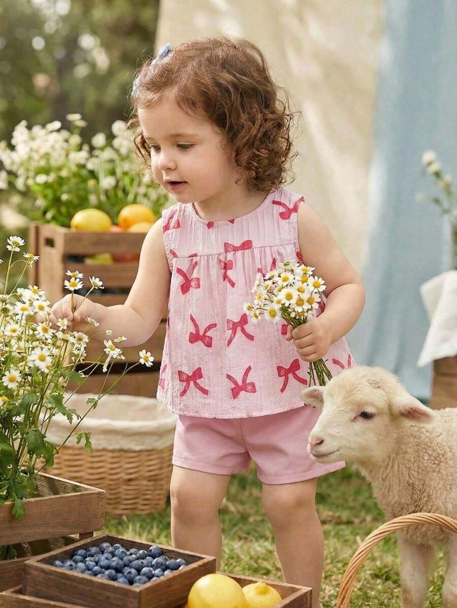 SHEIN 女婴白色纯色提花纹理面料圆领无袖露脐褶皱背心，饰以彩色波点印花，搭配粉色弹力腰舒适简约短裤，休闲度假装扮，春夏皆宜。 - 粉色 - 查看 1