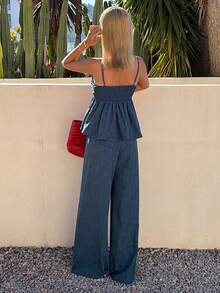 DAZY Bộ đồ 2 món thời trang đa năng gồm áo hai dây xẻ tà bất đối xứng và quần ống rộng cạp cao co giãn dành cho nữ. - Màu xanh hải quân - Xem 5